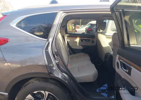 2019 Honda Cr-V Touring z USA, uszkodzony, nr VIN 5J6RW2H9XKL001608